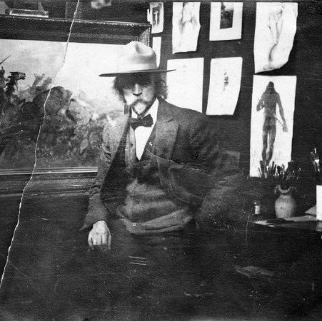 Photo of  artist Edgar Paxson standing in studio, PAc #944-297